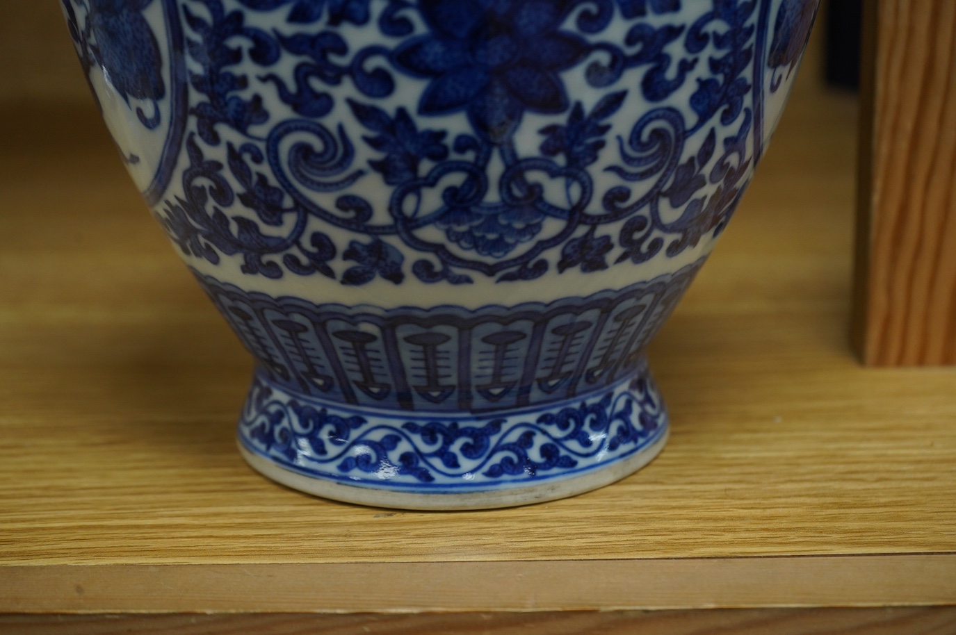 A Chinese blue and white 'peaches' vase, Qianlong mark but later, 27cm high. Condition - good